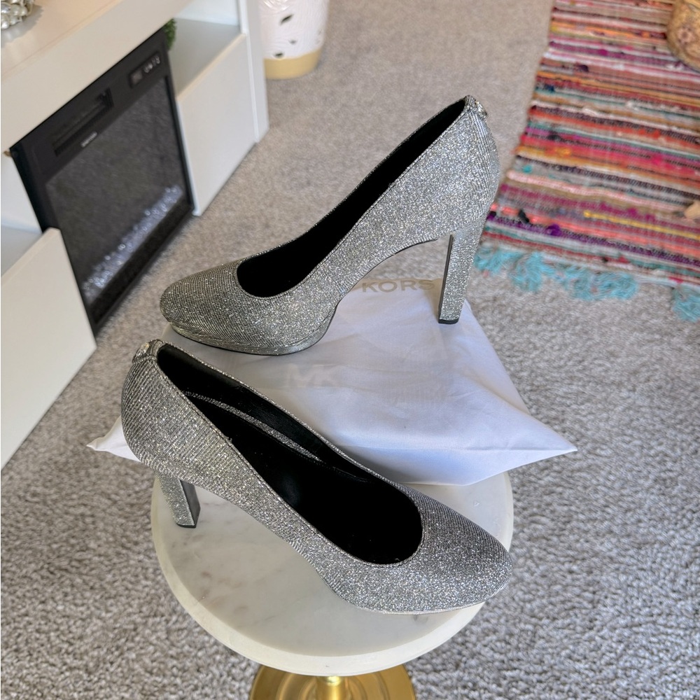 Stylish, new MK silver pumps